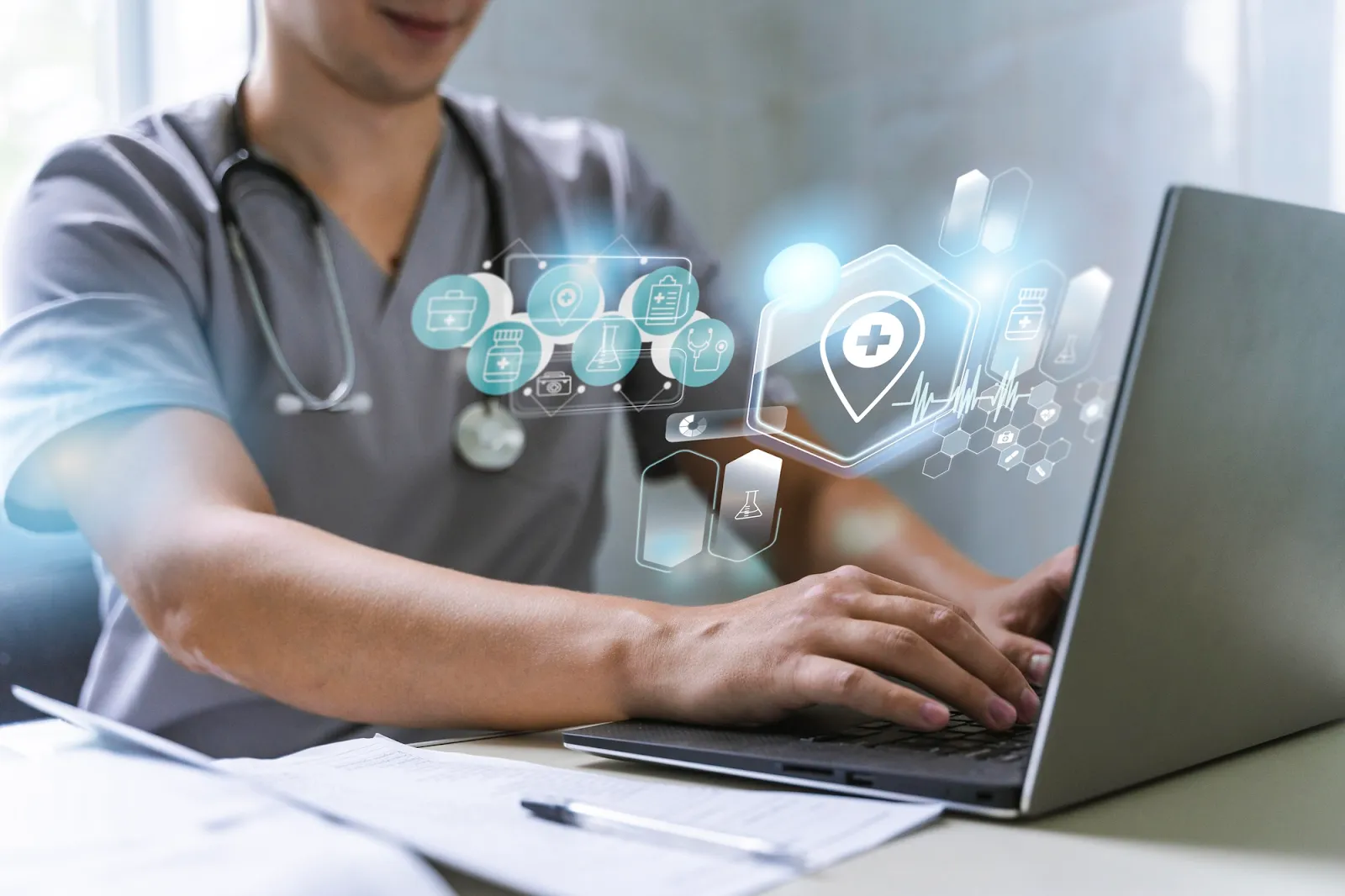 Doctor using a laptop with futuristic medical technology icons floating around.